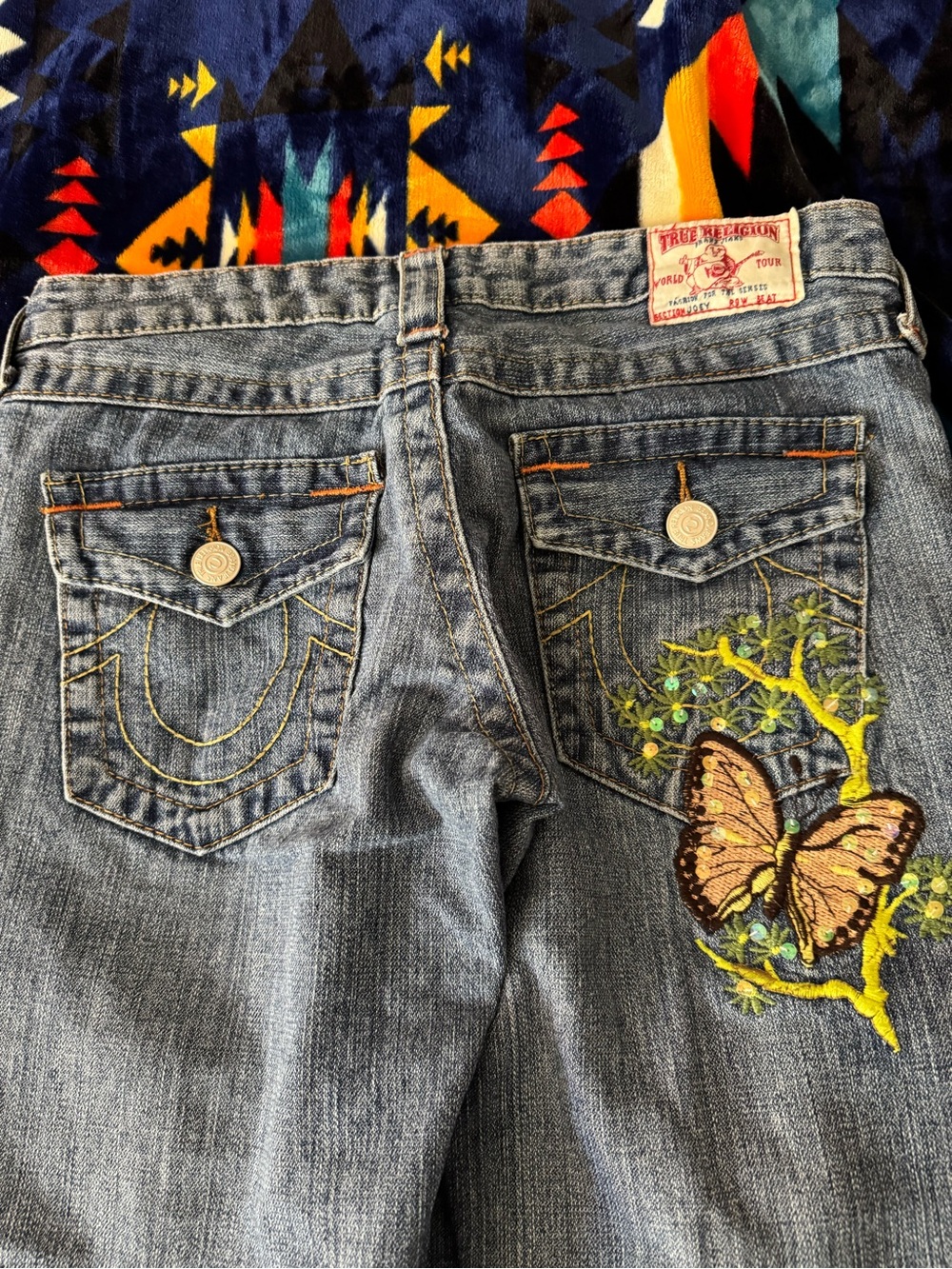 True Religion Blue Denim Jeans with Embroidered Butterfly